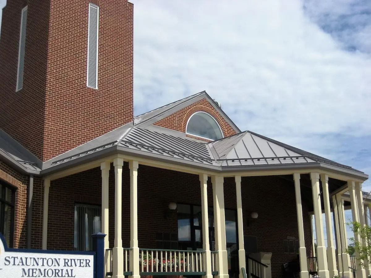 Skilled roofing craftsmen working on a residential roof in Aubrey